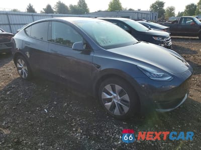 Czwarte zdjęcie samochodu z boku: 2022 TESLA MODEL Y VIN:7SAYGDEE6NF401901 - miniatura