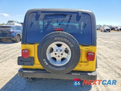 Zdjęcie 6 z 12 samochodu: 2001 JEEP WRANGLER / TJ SPORT VIN:1J4FA49S51P315902 - miniatura