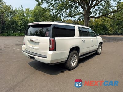 Czwarte zdjęcie samochodu z boku: 2019 GMC YUKON XL K1500 SLT VIN:1GKS2GKC2KR289548 - miniatura
