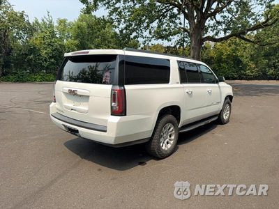Czwarte zdjęcie samochodu z boku: 2019 GMC YUKON XL K1500 SLT VIN:1GKS2GKC2KR289548 - miniatura