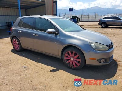 Czwarte zdjęcie samochodu z boku: 2011 VOLKSWAGEN GOLF VIN:WVWDM7AJ3BW035704 - miniatura