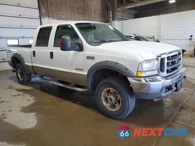 Czwarte zdjęcie samochodu z boku: 2004 FORD F250 SUPER DUTY VIN:1FTNW21P24ED16701 - miniatura