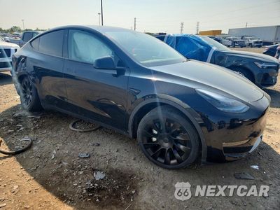 Czwarte zdjęcie samochodu z boku: 2023 TESLA MODEL Y VIN:7SAYGDEE8PF785571 - miniatura