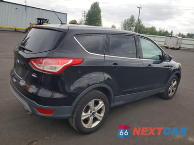 Trzecie zdjęcie samochodu z tyłu: 2016 FORD ESCAPE SE VIN:1FMCU9G93GUC14022 - miniatura