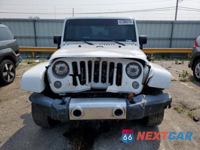 Piąte zdjęcie samochodu w środku: 2017 JEEP WRANGLER UNLIMITED SAHARA VIN:1C4BJWEGXHL524989 - miniatura