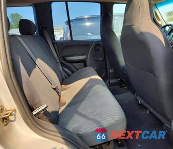 Zdjęcie 11 z 13 samochodu: 2002 JEEP LIBERTY SPORT VIN:1J4GL48K22W256248 - miniatura