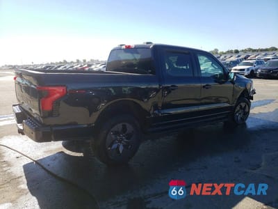 Trzecie zdjęcie samochodu z tyłu: 2024 FORD F150 LIGHTNING XLT VIN:1FTVW3LK6RWG06514 - miniatura