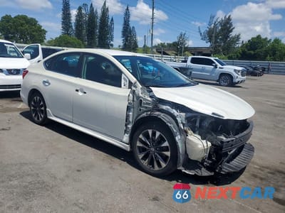 Czwarte zdjęcie samochodu z boku: 2018 NISSAN SENTRA SR VIN:3N1AB7AP0JY211809 - miniatura