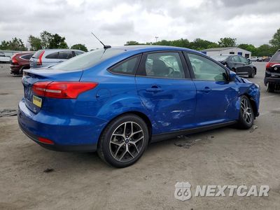 Trzecie zdjęcie samochodu z tyłu: 2018 FORD FOCUS SE VIN:1FADP3FE8JL204651 - miniatura