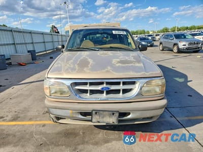 Piąte zdjęcie samochodu w środku: 1996 FORD EXPLORER VIN:1FMDU34X6TUA17053 - miniatura