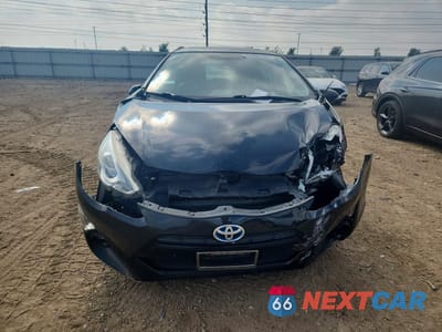 Piąte zdjęcie samochodu w środku: 2015 TOYOTA PRIUS C FOUR VIN:JTDKDTB3XF1090590 - miniatura