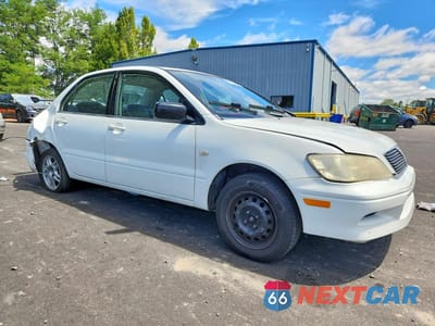 Czwarte zdjęcie samochodu z boku: 2002 MITSUBISHI LANCER ES VIN:JA3AJ26E12U020400 - miniatura