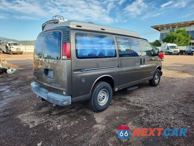 Czwarte zdjęcie samochodu z boku: 1999 CHEVROLET EXPRESS G3500 VIN:1GCHG35R8X1107292 - miniatura