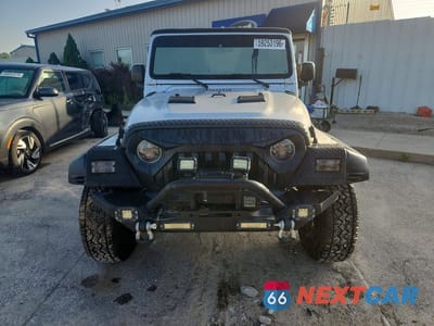Piąte zdjęcie samochodu w środku: 2003 JEEP WRANGLER COMMANDO/X VIN:1J4FA39S23P348207 - miniatura