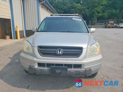 Piąte zdjęcie samochodu w środku: 2005 HONDA PILOT EXL VIN:5FNYF18665B015806 - miniatura