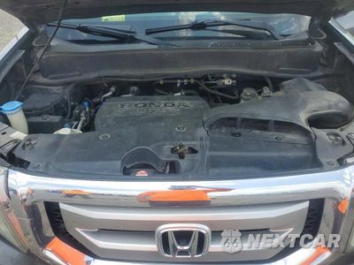 Zdjęcie 12 z 13 samochodu: 2011 HONDA PILOT EXLN VIN:5FNYF4H72BB103354 - miniatura