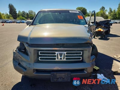Piąte zdjęcie samochodu w środku: 2007 HONDA RIDGELINE RTL VIN:2HJYK16527H525486 - miniatura