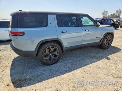 Trzecie zdjęcie samochodu z tyłu: 2023 RIVIAN R1S ADVENTURE VIN:7PDSGABA5PN023814 - miniatura