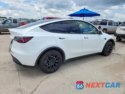 Trzecie zdjęcie samochodu z tyłu: 2023 TESLA MODEL Y VIN:7SAYGDEE3PA069934 - miniatura