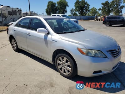 Czwarte zdjęcie samochodu z boku: 2007 TOYOTA CAMRY HYBRID VIN:JTNBB46KX73010672 - miniatura