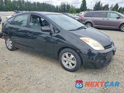 Czwarte zdjęcie samochodu z boku: 2004 TOYOTA PRIUS BASE VIN:JTDKB22U140114058 - miniatura