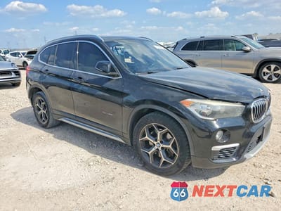 Czwarte zdjęcie samochodu z boku: 2017 BMW X1 SDRIVE28I VIN:WBXHU7C33H5H37560 - miniatura