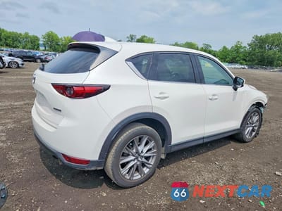 Trzecie zdjęcie samochodu z tyłu: 2021 MAZDA CX-5 GRAND TOURING VIN:JM3KFBDM2M1478959 - miniatura
