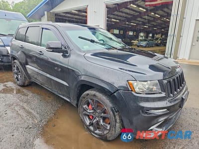 Czwarte zdjęcie samochodu z boku: 2013 JEEP GRAND CHEROKEE SRT-8 VIN:1C4RJFDJ9DC509907 - miniatura