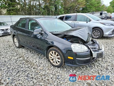 Czwarte zdjęcie samochodu z boku: 2010 VOLKSWAGEN JETTA SE VIN:3VWRZ7AJ3AM106368 - miniatura
