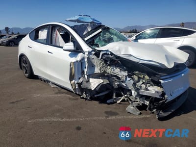 Czwarte zdjęcie samochodu z boku: 2026 TESLA MODEL Y VIN:7SAYGDEDXTF407916 - miniatura