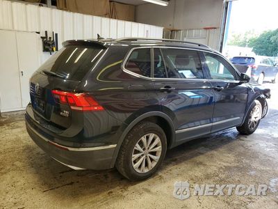 Trzecie zdjęcie samochodu z tyłu: 2018 VOLKSWAGEN TIGUAN SE VIN:3VV2B7AX5JM067992 - miniatura
