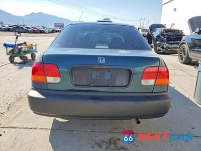 Zdjęcie 6 z 13 samochodu: 1997 HONDA CIVIC DX VIN:JHMEJ6523VS035223 - miniatura