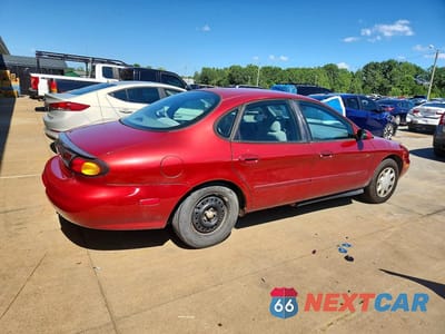 Trzecie zdjęcie samochodu z tyłu: 1996 FORD TAURUS GL VIN:1FALP52U2TG241369 - miniatura