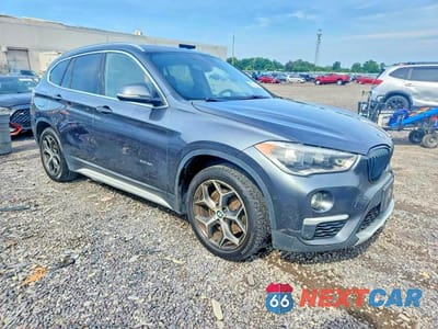 Czwarte zdjęcie samochodu z boku: 2017 BMW X1 XDRIVE28I VIN:WBXHT3C33H5F72590 - miniatura
