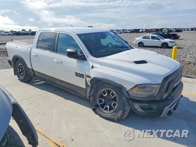 Czwarte zdjęcie samochodu z boku: 2015 RAM 1500 REBEL VIN:1C6RR7YT1FS741704 - miniatura