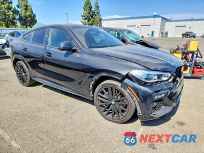 Czwarte zdjęcie samochodu z boku: 2020 BMW X6 M50I VIN:5UXCY8C02L9D51073 - miniatura