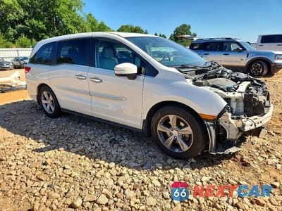 Czwarte zdjęcie samochodu z boku: 2018 HONDA ODYSSEY EXL VIN:5FNRL6H75JB047322 - miniatura