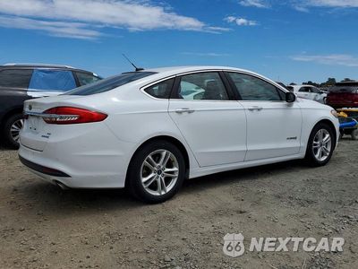 Trzecie zdjęcie samochodu z tyłu: 2018 FORD FUSION SE HYBRID VIN:3FA6P0LU7JR171548 - miniatura