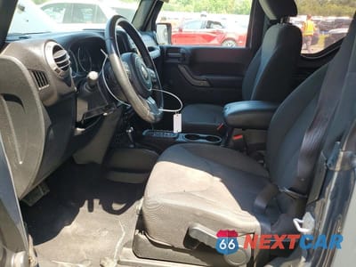 Zdjęcie 7 z 12 samochodu: 2017 JEEP WRANGLER SPORT VIN:1C4AJWAG6HL538910 - miniatura