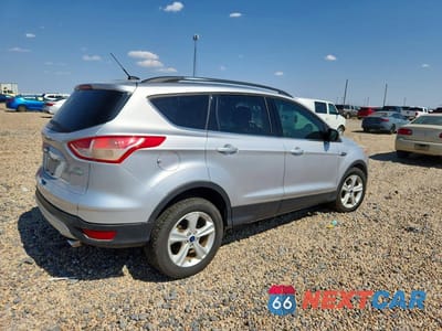 Trzecie zdjęcie samochodu z tyłu: 2014 FORD ESCAPE SE VIN:1FMCU0GX8EUC29817 - miniatura