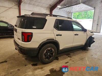 Trzecie zdjęcie samochodu z tyłu: 2026 HONDA PASSPORT TRAILSPORT ELITE VIN:5FNYF9H86TB036216 - miniatura