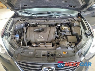 Zdjęcie 12 z 13 samochodu: 2016 MAZDA CX-5 SPORT VIN:JM3KE4BY5G0887777 - miniatura