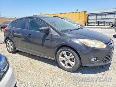 Czwarte zdjęcie samochodu z boku: 2012 FORD FOCUS SE VIN:1FAHP3K25CL343233 - miniatura