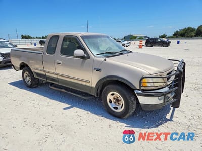 Czwarte zdjęcie samochodu z boku: 1997 FORD F150 VIN:1FTDX1768VKD35371 - miniatura