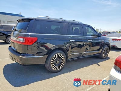 Trzecie zdjęcie samochodu z tyłu: 2018 LINCOLN NAVIGATOR L BLACK LABEL VIN:5LMJJ3TT2JEL09099 - miniatura