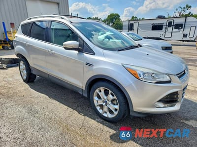 Czwarte zdjęcie samochodu z boku: 2014 FORD ESCAPE TITANIUM VIN:1FMCU9J9XEUD17167 - miniatura