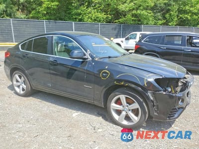 Czwarte zdjęcie samochodu z boku: 2015 BMW X4 XDRIVE28I VIN:5UXXW3C54F0F88694 - miniatura