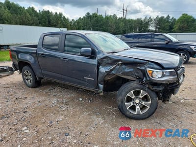 Czwarte zdjęcie samochodu z boku: 2017 CHEVROLET COLORADO Z71 VIN:1GCGSDEN4H1185907 - miniatura
