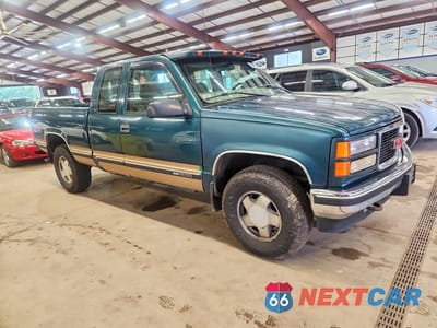 Czwarte zdjęcie samochodu z boku: 1997 GMC SIERRA K1500 VIN:2GTEK19R1V1566400 - miniatura
