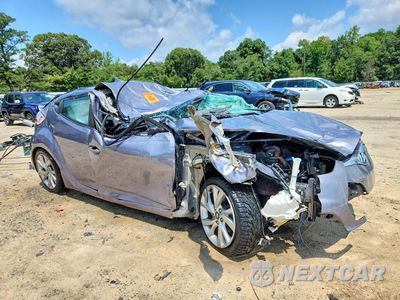Czwarte zdjęcie samochodu z boku: 2017 HYUNDAI VELOSTER BASE VIN:KMHTC6AD3HU323371 - miniatura